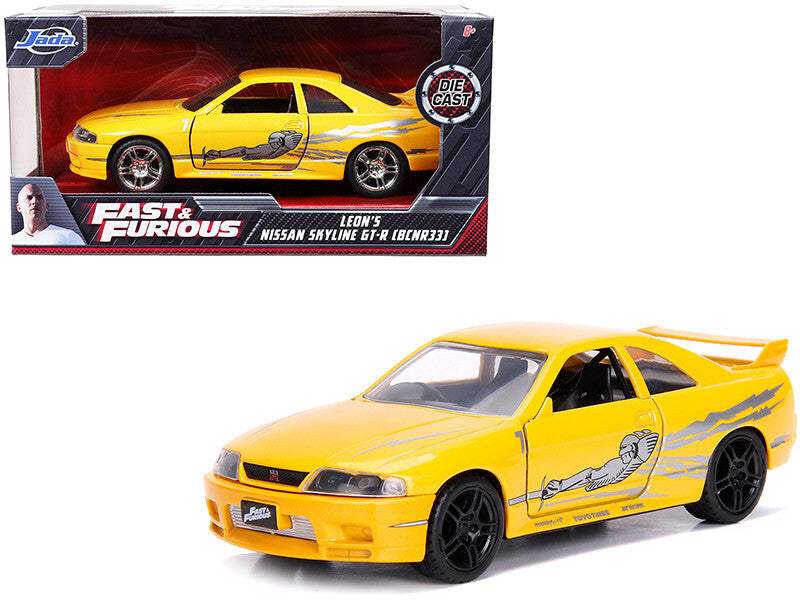 Leon's Nissan Skyline GT-R (BCNR33) Yellow Metallic with Graphics | 1/32 Diecast Model Car | Jada | Fast & Furious Series