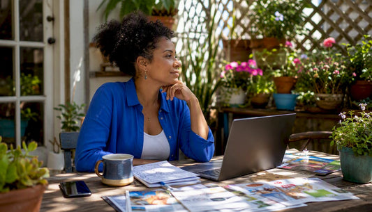 Mother browsing toy retailers at home laptop