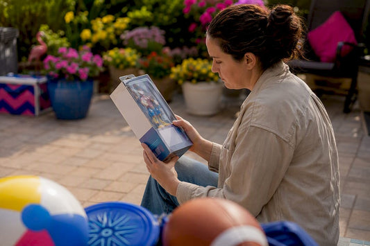 Parent checking toy safety label on package