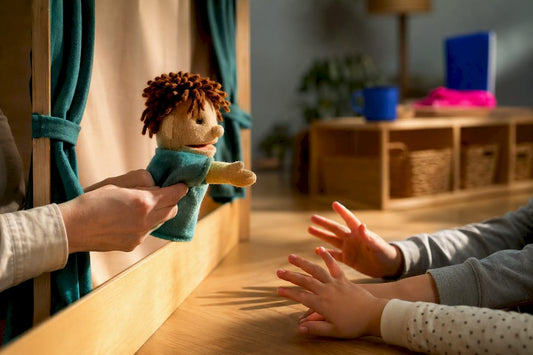 Children improvising with handmade puppets