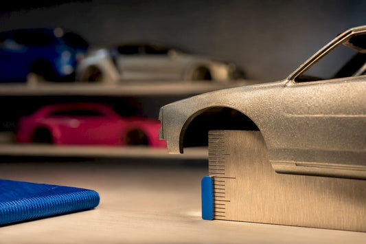 Diecast model detail beside scale ruler