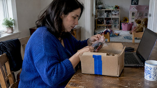Parent checking toy parcel costs