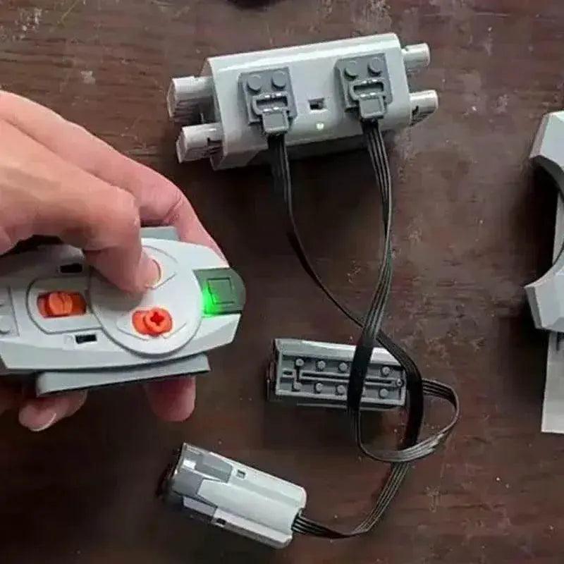  2025 NEW Upgrade Dual PF Interface Multifunction Power Functions Battery Box with Electric APP Bluetooth IR Remote Control Toys -  ToylandEU™