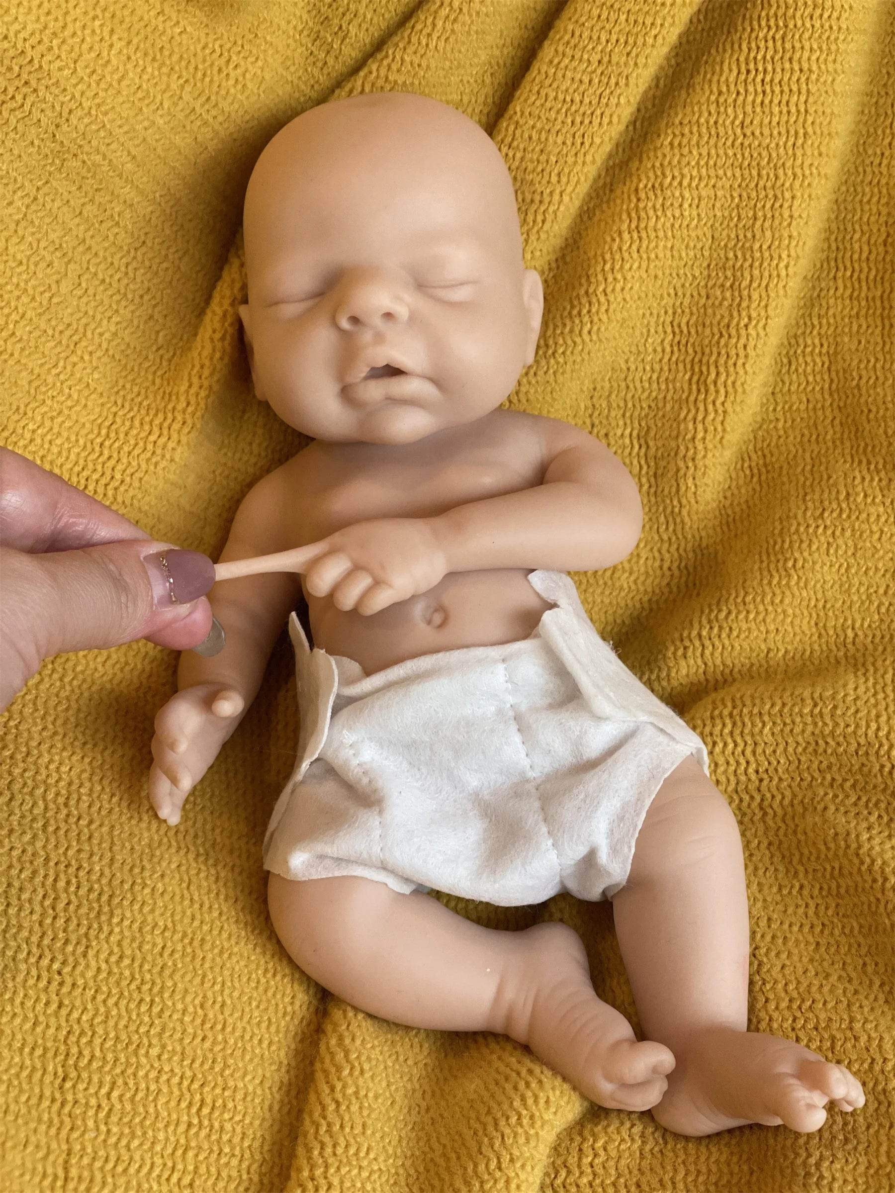 26cm Washable Dark Skin Solid Bebe Reborn Girl With Rooted Black Hair 3D Painted Skin Full Body Silicone Lifelike Reborn Dolls - ToylandEU