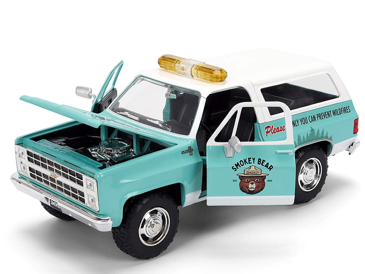 1980 Chevrolet Blazer Light Green with White Top and Graphics and Smokey Bear | 1/24 Scale Figure | Jada | Collector Quality