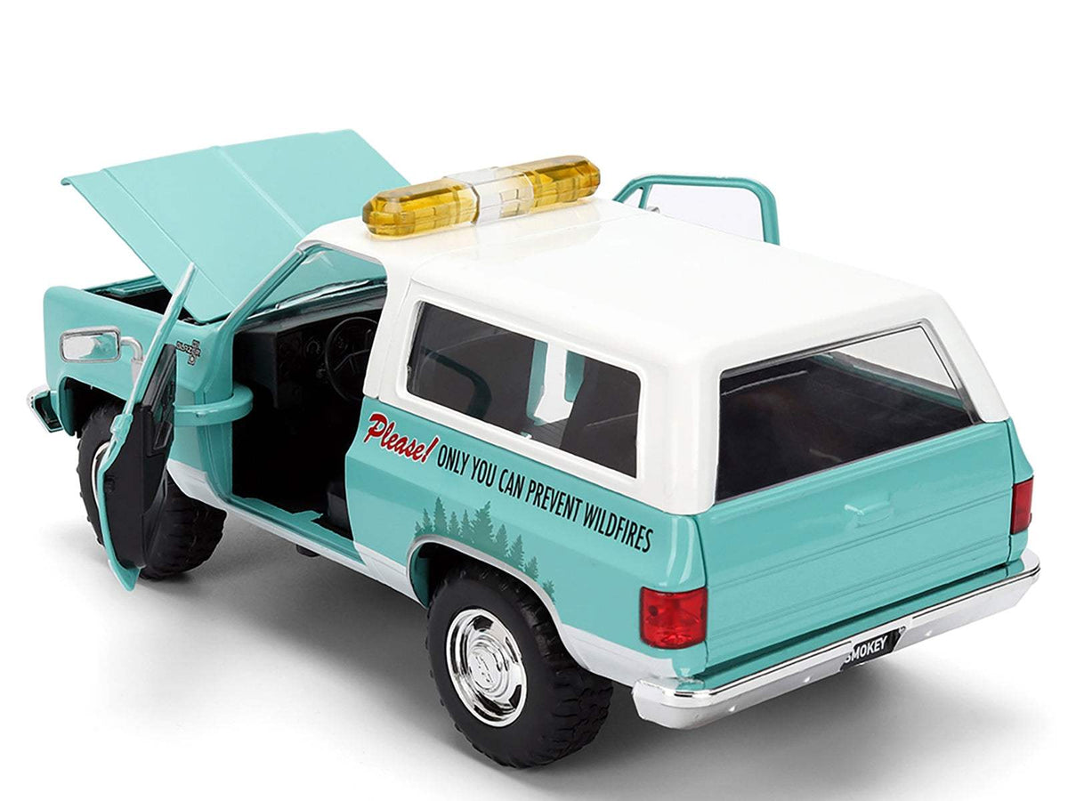 1980 Chevrolet Blazer Light Green with White Top and Graphics and Smokey Bear | 1/24 Scale Figure | Jada | Collector Quality
