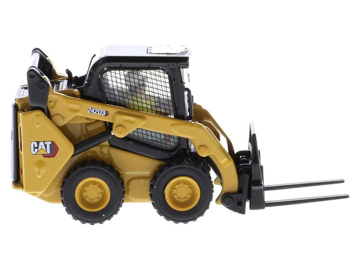 CAT Caterpillar 242D3 Wheeled Skid Steer Loader with Work Tools and Operator Yellow | 1/50 Diecast Construction Model | Diecast Masters | High Line