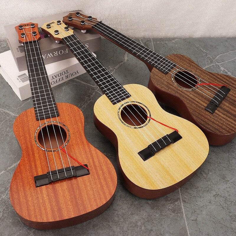 Beginner's 35cm Kids Guitar Toy with Pick - Perfect for Young Musicians! - ToylandEU