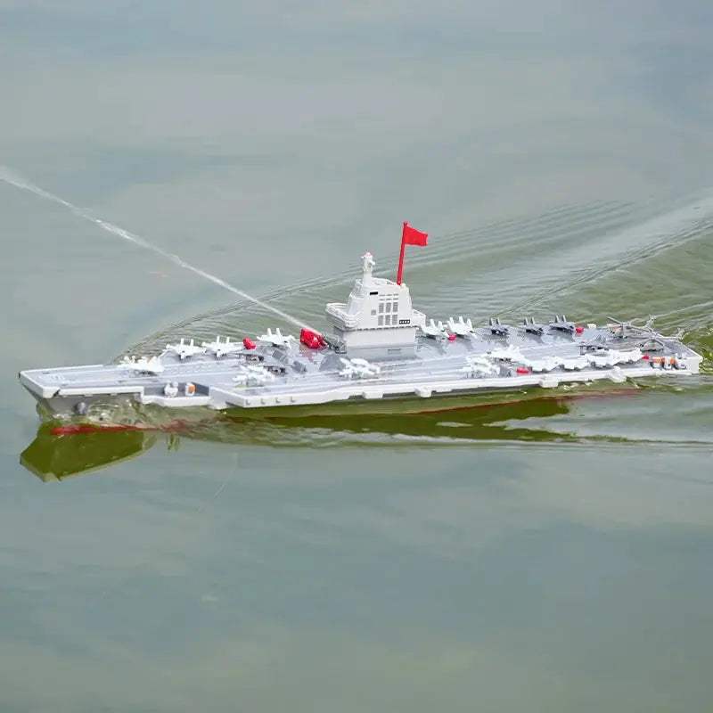 Remote Control Boat 2.4G Water Spraying Battleship For Kids - ToylandEU