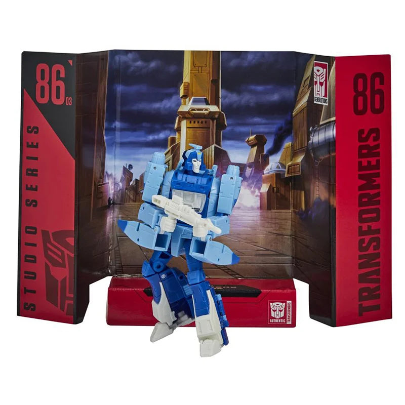 Adaptable Studio Series 86-03 Blurr Deluxe Class Figure - ToylandEU