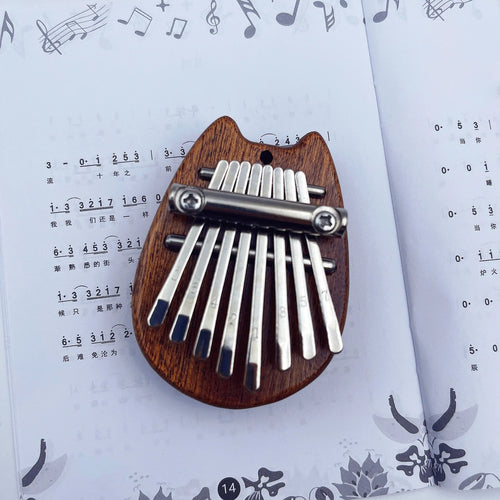1Pcs Mini Thumb Piano Musical Toys 8 Tones Scales Portable Beginner ToylandEU.com Toyland EU