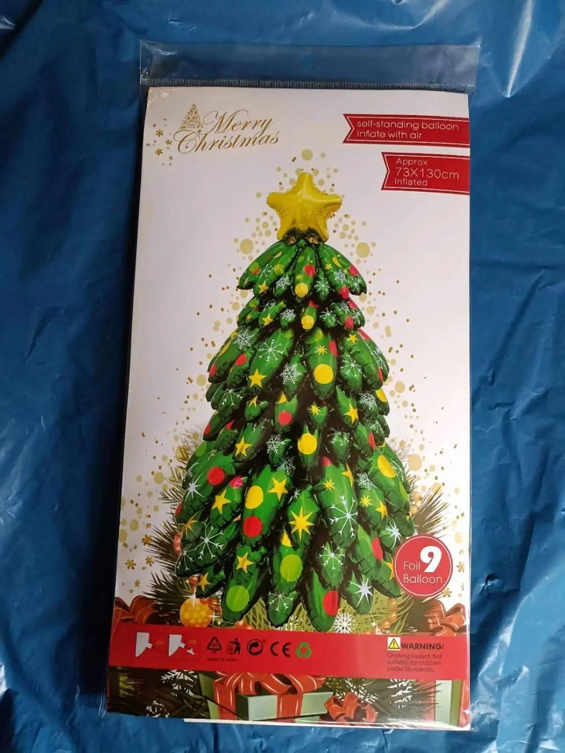 Christmas Tree Mylar Balloon | Self Standing | 51 Inch Green With Santa Topper