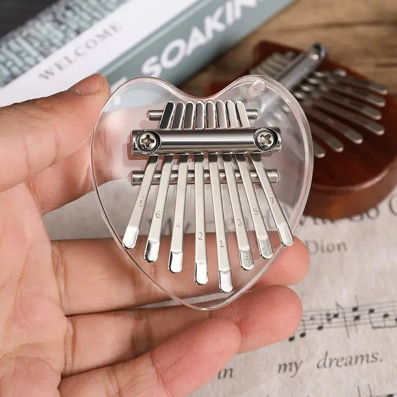 1Pcs Mini Thumb Piano Musical Toys 8 Tones Scales Portable Beginner