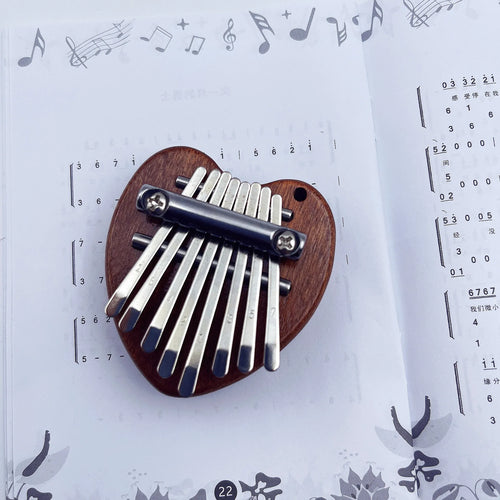 1Pcs Mini Thumb Piano Musical Toys 8 Tones Scales Portable Beginner ToylandEU.com Toyland EU