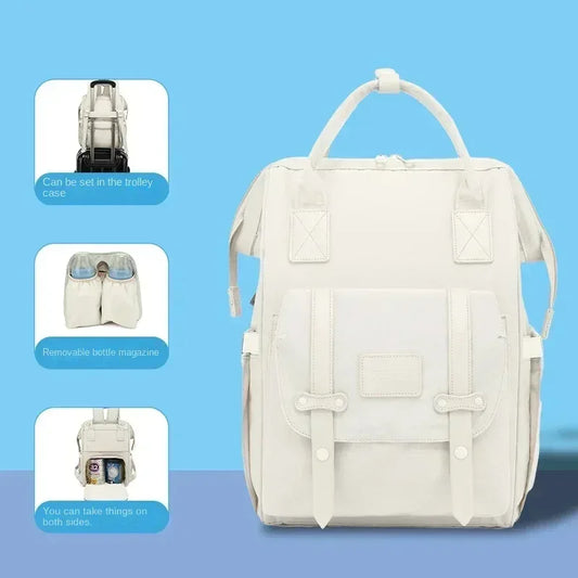 Mochila impermeável para fraldas, ideal para viagens e organização.